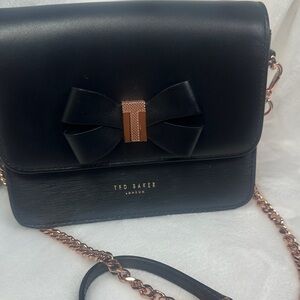 Ted Baker Calliih mini Crossbody Bag.  Removable chain and accents on the bow.